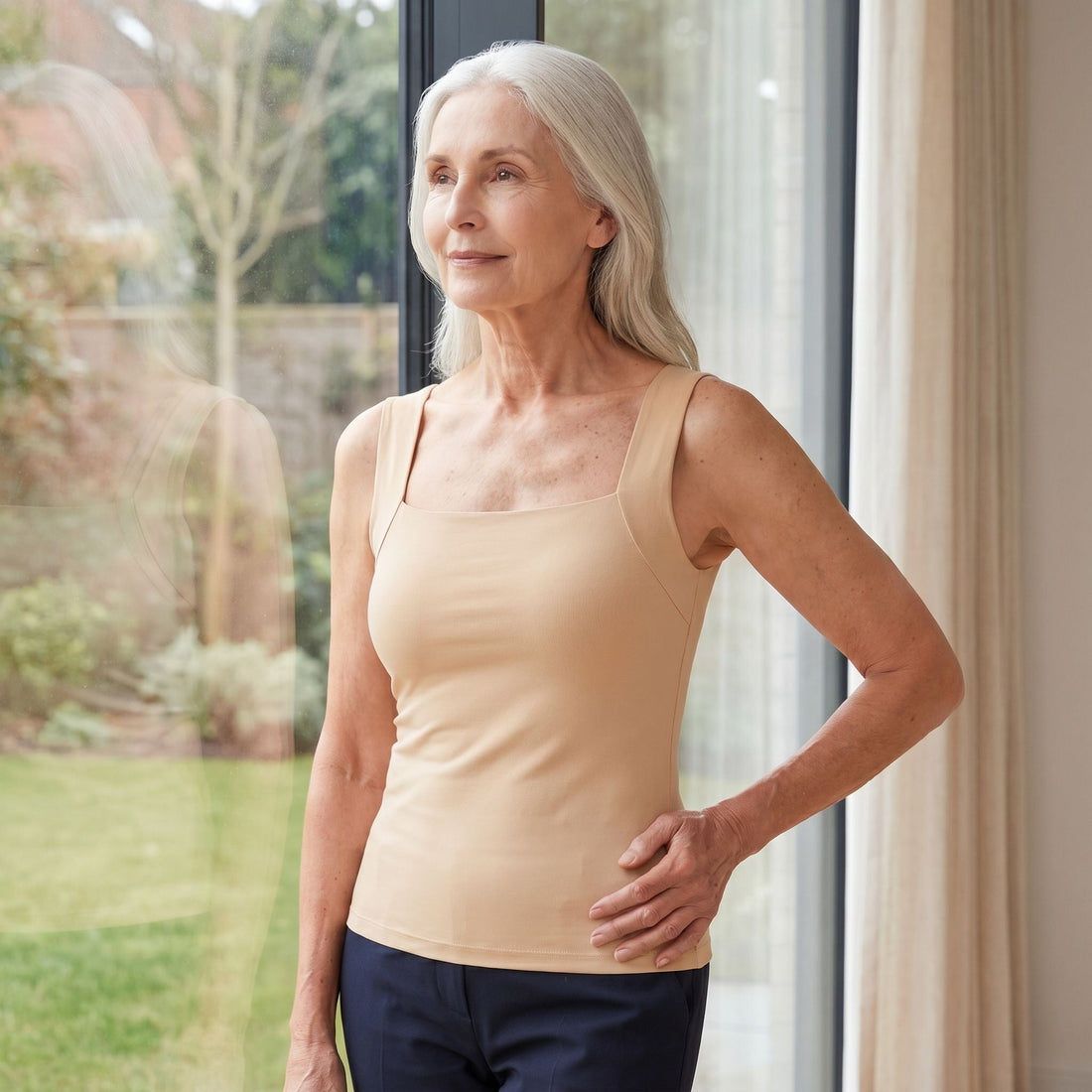 Woman going braless with support wearing Velcy built-in bra tank top