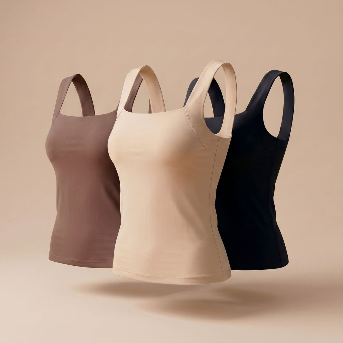 Woman with larger bust wearing Velcy built-in bra comfort shaper tank top in beige